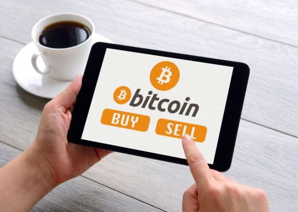 Wall of Coins for Selling and Buying Bitcoin - Secure Investments