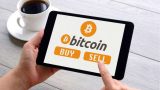 Wall of Coins for Selling and Buying Bitcoin